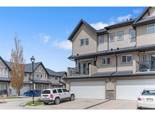 74 Cimarron Vista Gardens, Okotoks, AB - Outdoor With Facade