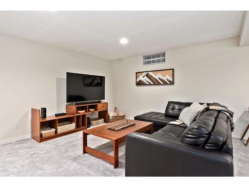 240 Woodridge Place Sw, Calgary, AB - Indoor Photo Showing Living Room