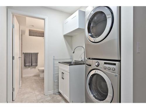 240 Woodridge Place Sw, Calgary, AB - Indoor Photo Showing Laundry Room