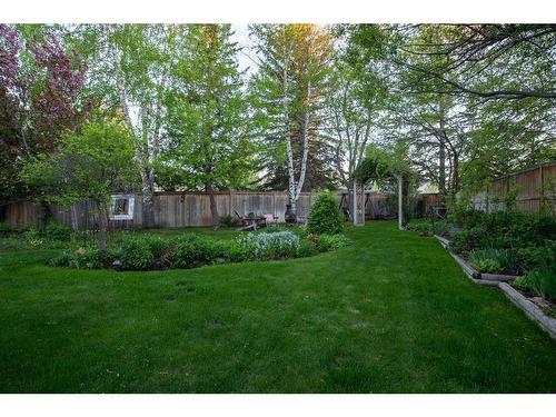 240 Woodridge Place Sw, Calgary, AB - Outdoor With Backyard