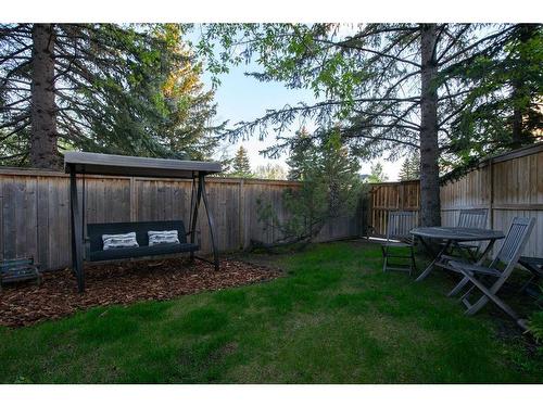 240 Woodridge Place Sw, Calgary, AB - Outdoor With Backyard