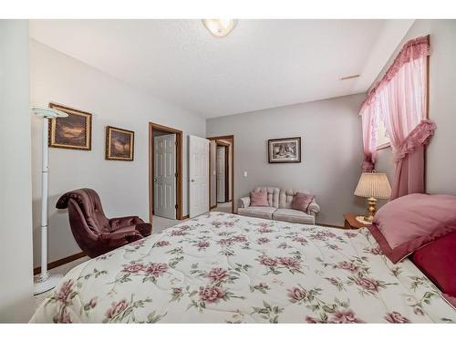 28 Eagleview Gate, Cochrane, AB - Indoor Photo Showing Bedroom