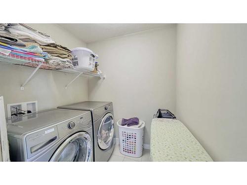 164 Nolanlake View Nw, Calgary, AB - Indoor Photo Showing Laundry Room