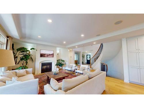 202 Chapala Point Se, Calgary, AB - Indoor Photo Showing Living Room With Fireplace