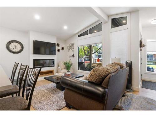 1417 22 Avenue Nw, Calgary, AB - Indoor Photo Showing Other Room With Fireplace