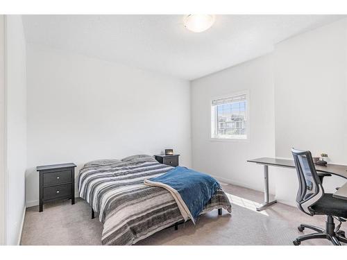 244 Cranston Way Se, Calgary, AB - Indoor Photo Showing Bedroom