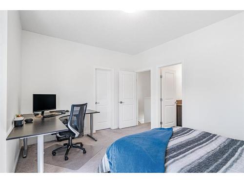 244 Cranston Way Se, Calgary, AB - Indoor Photo Showing Bedroom