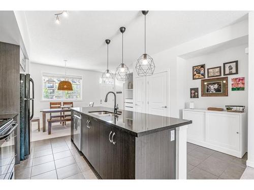 244 Cranston Way Se, Calgary, AB - Indoor Photo Showing Kitchen With Upgraded Kitchen