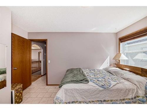 48 Fairways Drive Nw, Airdrie, AB - Indoor Photo Showing Bedroom