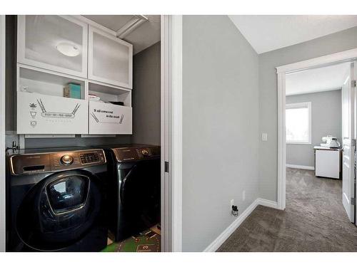 55 Nolanlake View Nw, Calgary, AB - Indoor Photo Showing Laundry Room