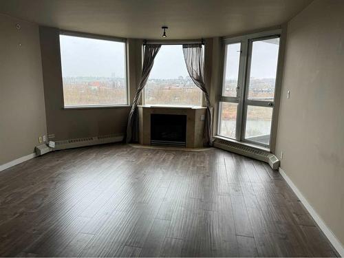 714-1108 6 Avenue Sw, Calgary, AB - Indoor With Fireplace