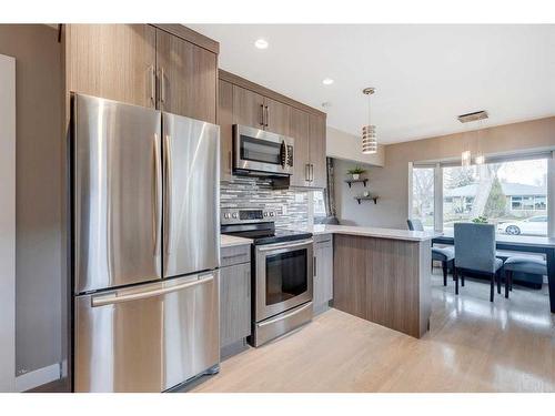 213 Havenhurst Crescent Sw, Calgary, AB - Indoor Photo Showing Kitchen With Stainless Steel Kitchen With Upgraded Kitchen