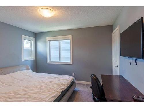 2237 Bayside Road Sw, Airdrie, AB - Indoor Photo Showing Bedroom