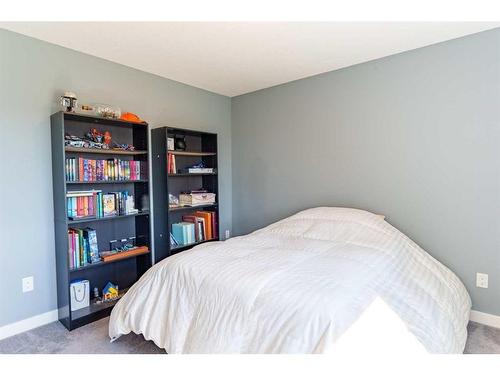 2237 Bayside Road Sw, Airdrie, AB - Indoor Photo Showing Bedroom