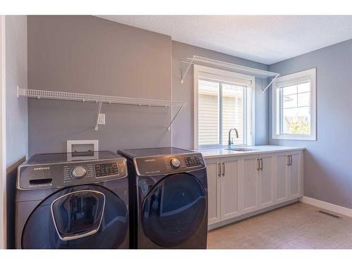 2237 Bayside Road Sw, Airdrie, AB - Indoor Photo Showing Laundry Room