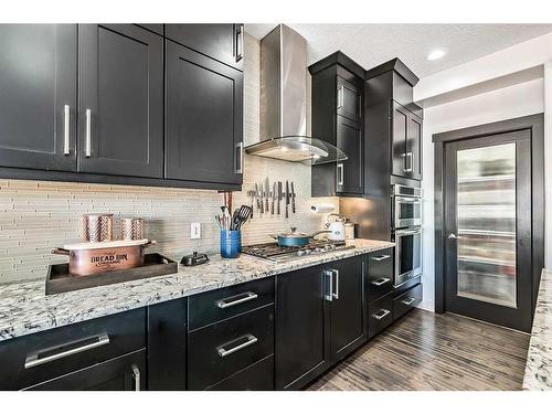 16 Marquis Grove Se, Calgary, AB - Indoor Photo Showing Kitchen With Upgraded Kitchen