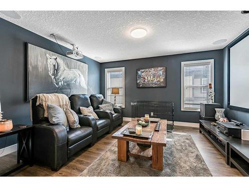 16 Marquis Grove Se, Calgary, AB - Indoor Photo Showing Living Room