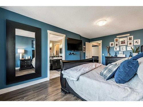 16 Marquis Grove Se, Calgary, AB - Indoor Photo Showing Bedroom