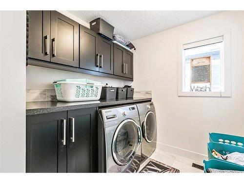 16 Marquis Grove Se, Calgary, AB - Indoor Photo Showing Laundry Room