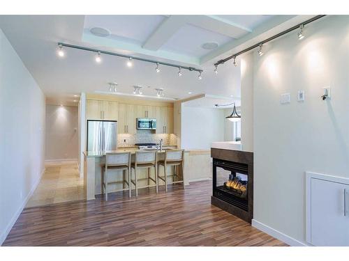 304-701 3 Avenue Sw, Calgary, AB - Indoor With Fireplace