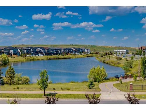 107 Brightondale Crescent Se, Calgary, AB - Outdoor With Body Of Water With View