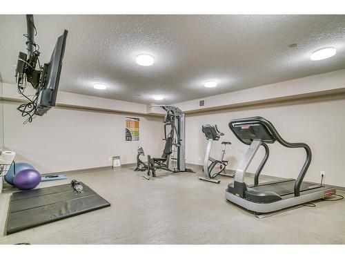 224-500 Rocky Vista Gardens Nw, Calgary, AB - Indoor Photo Showing Gym Room