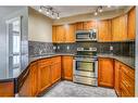 224-500 Rocky Vista Gardens Nw, Calgary, AB  - Indoor Photo Showing Kitchen With Stainless Steel Kitchen With Double Sink 