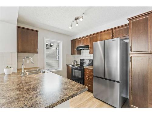 229 Cityscape Lane Ne, Calgary, AB - Indoor Photo Showing Kitchen With Double Sink