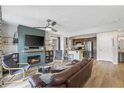 229 Cityscape Lane Ne, Calgary, AB - Indoor Photo Showing Living Room With Fireplace