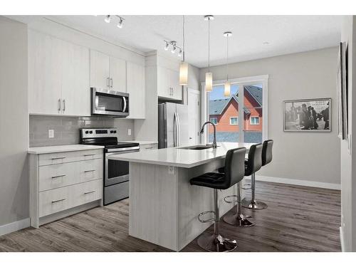 142 Livingston Common Ne, Calgary, AB - Indoor Photo Showing Kitchen With Stainless Steel Kitchen With Upgraded Kitchen