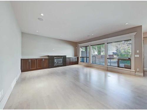 2340 7 Avenue Nw, Calgary, AB - Indoor With Fireplace