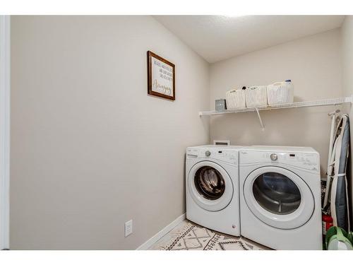 176 Masters Crescent Se, Calgary, AB - Indoor Photo Showing Laundry Room
