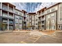 1307-681 Savanna Boulevard Ne, Calgary, AB  - Outdoor With Balcony With Facade 