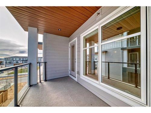 1307-681 Savanna Boulevard Ne, Calgary, AB - Outdoor With Balcony With Exterior