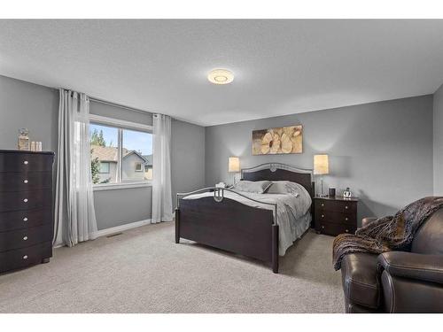 24 Cranleigh Drive Se, Calgary, AB - Indoor Photo Showing Bedroom