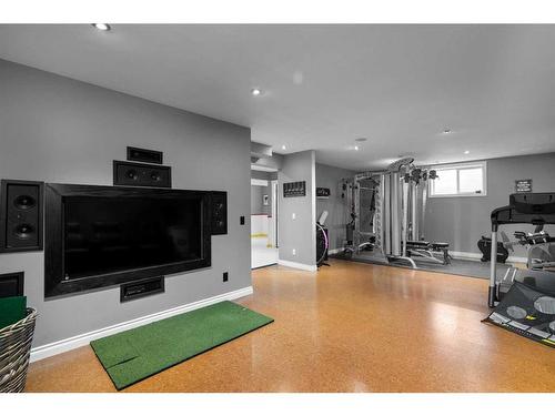 24 Cranleigh Drive Se, Calgary, AB - Indoor Photo Showing Gym Room