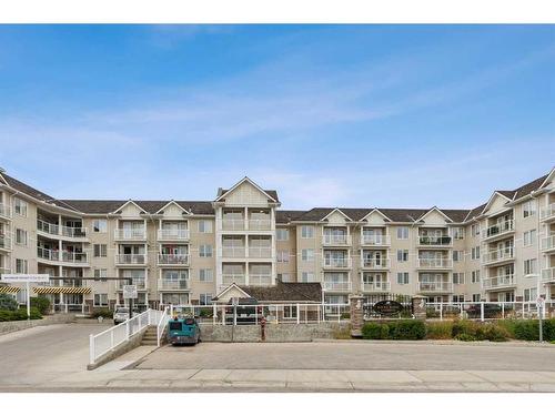 110-500 Rocky Vista Gardens Nw, Calgary, AB - Outdoor With Balcony With Facade