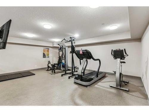 110-500 Rocky Vista Gardens Nw, Calgary, AB - Indoor Photo Showing Gym Room