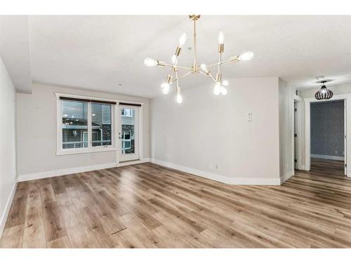 110-500 Rocky Vista Gardens Nw, Calgary, AB - Indoor Photo Showing Living Room