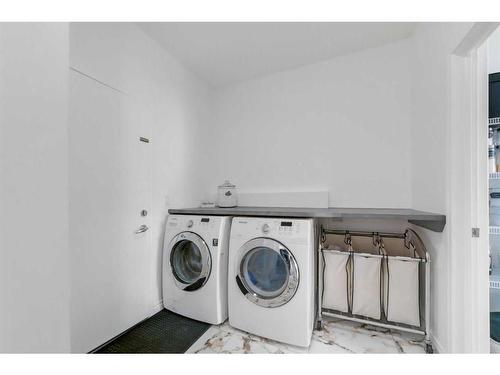 48 Auburn Sound Crescent Se, Calgary, AB - Indoor Photo Showing Laundry Room