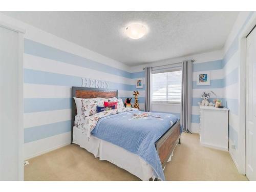 48 Auburn Sound Crescent Se, Calgary, AB - Indoor Photo Showing Bedroom