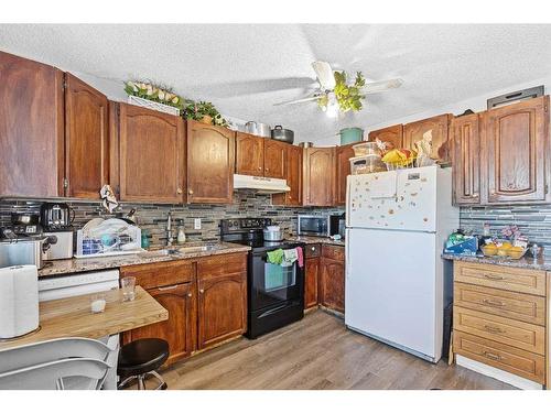 42 Templeby Way Ne, Calgary, AB - Indoor Photo Showing Kitchen With Double Sink
