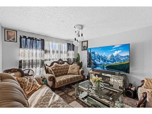 42 Templeby Way Ne, Calgary, AB - Indoor Photo Showing Living Room