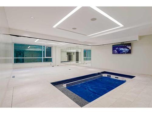 2906 Marquette Street Sw, Calgary, AB - Indoor Photo Showing Other Room With In Ground Pool