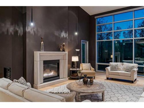 2906 Marquette Street Sw, Calgary, AB - Indoor Photo Showing Living Room With Fireplace