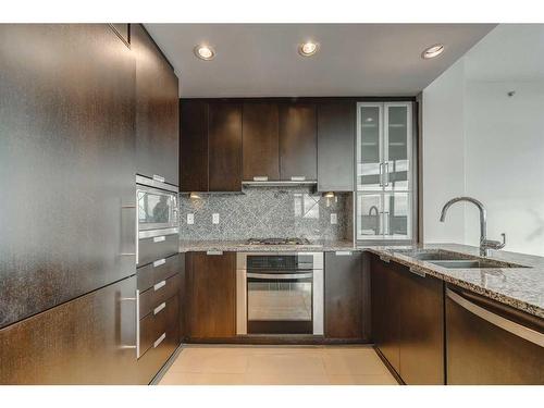 2102-99 Spruce Place Sw, Calgary, AB - Indoor Photo Showing Kitchen With Double Sink With Upgraded Kitchen