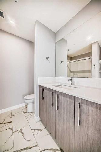 1118-681 Savanna Boulevard Ne, Calgary, AB - Indoor Photo Showing Bathroom