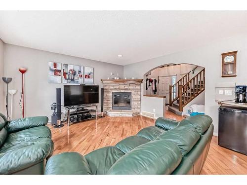 559 Auburn Bay Heights Se, Calgary, AB - Indoor Photo Showing Living Room With Fireplace