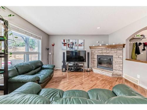 559 Auburn Bay Heights Se, Calgary, AB - Indoor Photo Showing Living Room With Fireplace
