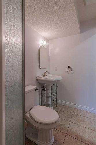 49 Rocky Ridge Green Nw, Calgary, AB - Indoor Photo Showing Bathroom